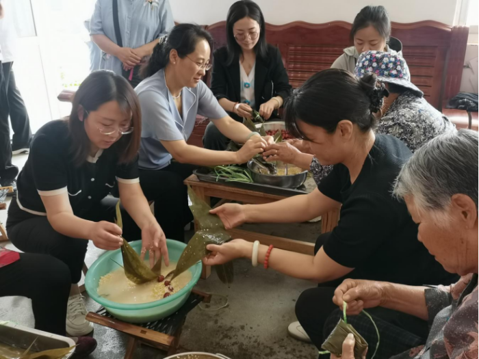 济南市莱芜区举办台港澳侨界“粽叶飘香_端午敬老”包粽子联谊活动109